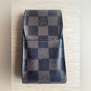 Louis Vuitton Iconic Damien cigarette case.